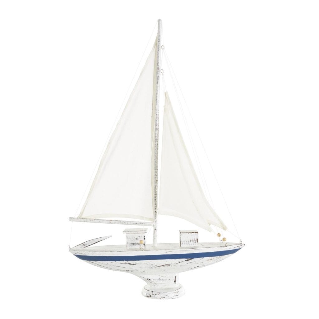 Velero decorativo estilo náutico en blanco y azul con velas de tela blanca y acabado rústico