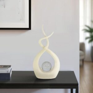 Escultura abstracta marfil con esfera decorativa