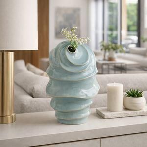 Florero decorativo azul con forma de concha marina